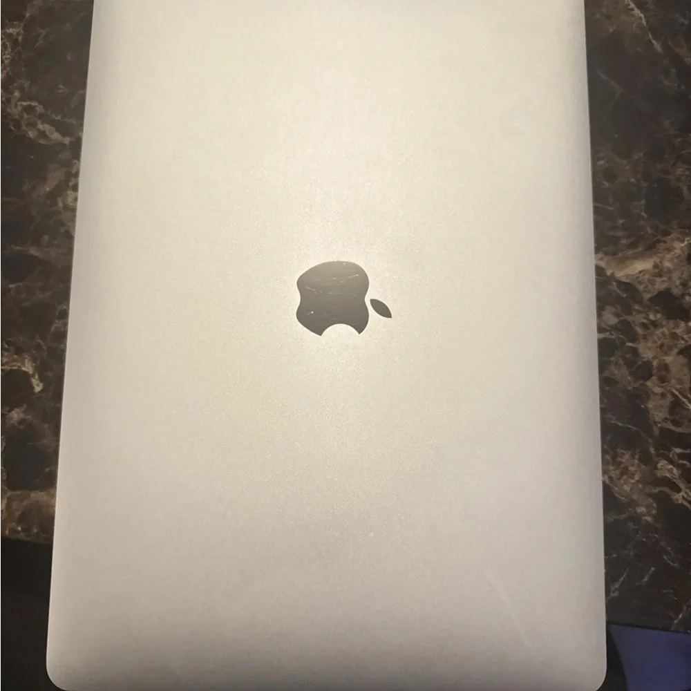 New Apple MacBook 13 inch 2020, 256 gb- Silver Just opener the box- new